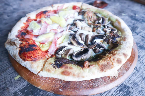 Hawaiian pizza and pesto mushroom pizza ,half and half topping pizza or split half topping pizza or Italian pizza