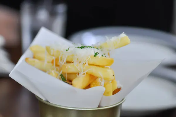 French fries or fried potato ,cheese fries or french fries with cheese topping for serve