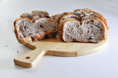 walnut cranberry sourdough bread or cranberry sourdough in the wooden tray clipart