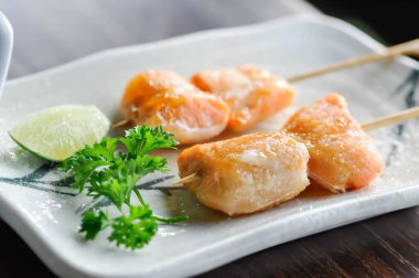 salmon satay or grilled salmon , roasted salmon or Japanese food or Japanese satay clipart