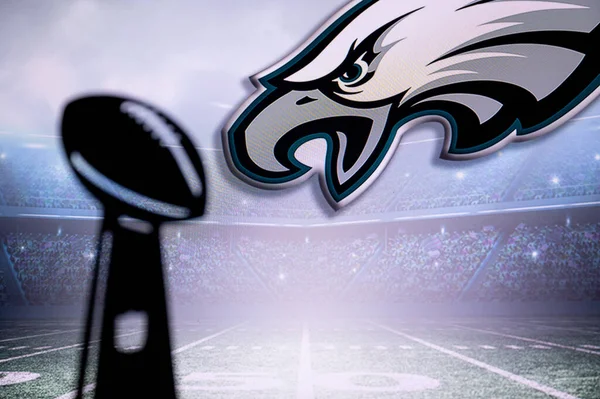 PHOENIX, USA, 30 JANUARY 3, 2023: Philadelphia Eagles logo and silhouette of Vince Lombardi Trophy for the winner of National Football League.