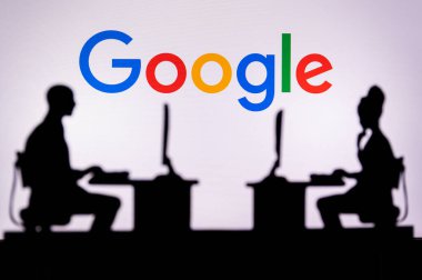 LOS ANGELES, USA, JANUARY 30, 2023: Google. Collaboration Leads to Progress: Two Developers Working Together Under the Company's Logo