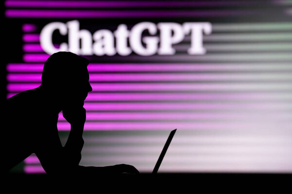 INDIA, NEW DELHI. JANUARY 30, 2023: ChatGPT. The Future of Online Experience: Man Embraces Cutting-Edge Technology