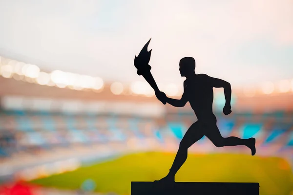 Symbol Unity Silhouette Athlete Carrying Torch Relay Modern Track Field — Stock Photo, Image