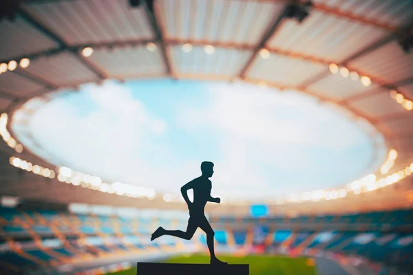 Focused Track Field Silhouette Male Athlete Dedicated Runner Piercing Dusk — Stock Photo, Image