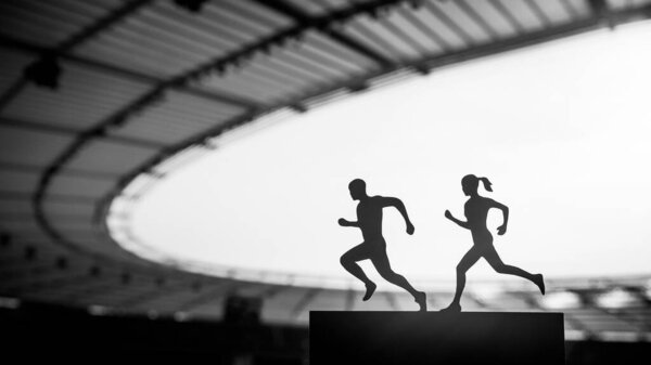 Shared Passion: Silhouettes of Male and Female Runners Create a Mesmerizing Display of Teamwork at a Modern Sports Stadium. Black and White photo, edit space for your montage