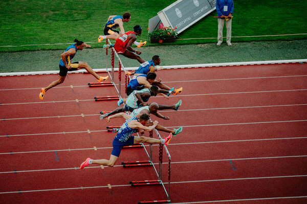 OSTRAVA, CZECHIA, JUNE 27, 2023: Athletes Compete in 110m Hurdles Race During Track and Field Championship for Worlds in Budapest and Games in Paris