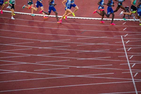 OSTRAVA, CZECHIA, JUNE 27, 2023: Legs of endurance Track and Field Athletes. Edit space