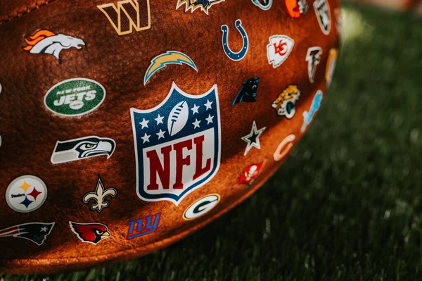 stock image NEW YORK, USA, SEPTEMBER 11, 2023: Detailed View of the NFL Leather Ball - Official Ball of National Football League with logos of the teams placed on the ball
