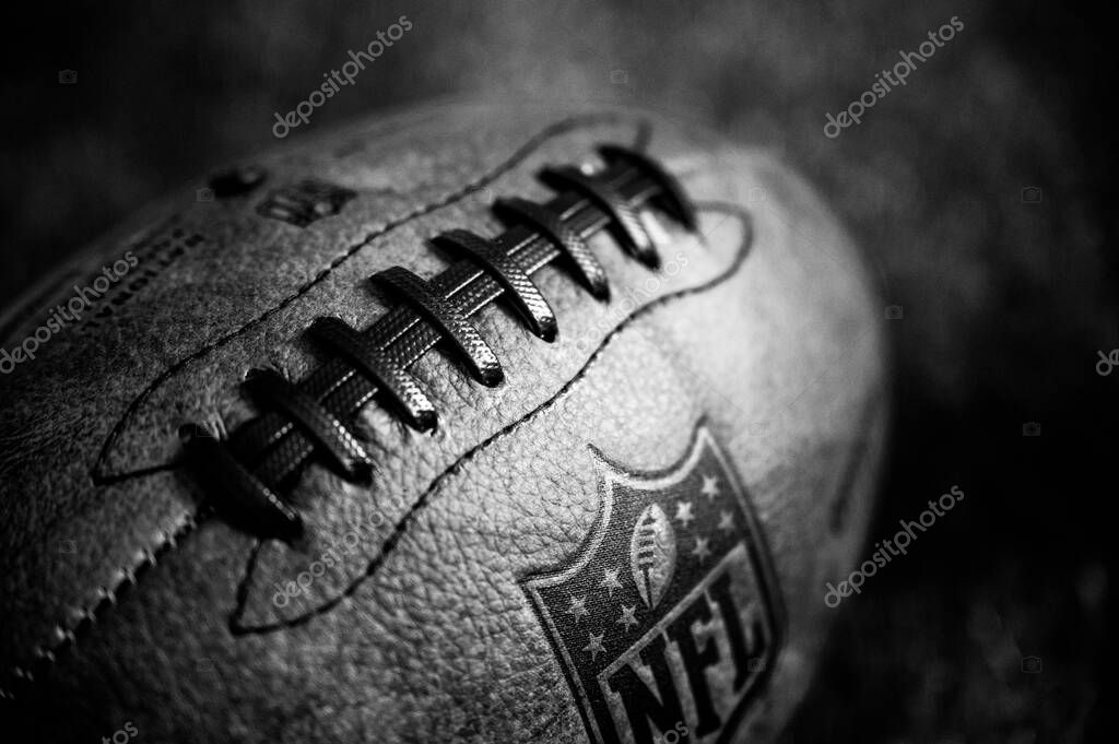 NEW YORK, USA, SEPTEMBER 11, 2023: NFL football Ball detail on the official ball, black and white photo