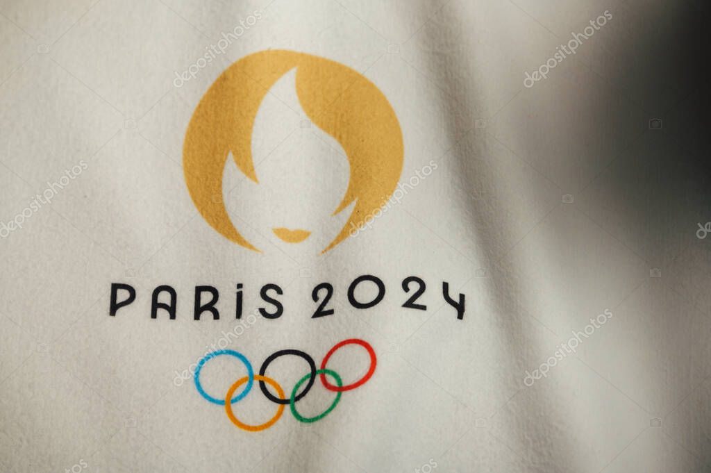 PARIS, FRANCE, JANUARY 4. 2024: White Backdrop Showcasing the Official Logo of the Paris 2024 Summer Olympics