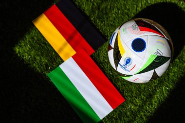 BERLIN, GERMANY, APRIL 17, 2024: Germany vs Hungary, Euro 2024 Group A football match at Stuttgart Arena, Stuttgart, 19 June 2024, official ball on green grass clipart