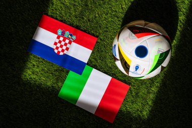 MUNICH, GERMANY, APRIL 17, 2024: Croatia vs Italy, Euro 2024 Group B football match at Leipzig Stadium, Leipzig, 24 June 2024, official ball on green grass clipart