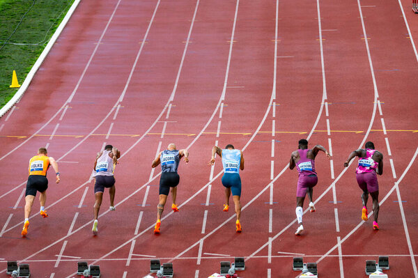 OSTRAVA, CZECHIA, MAY 28, 2024: Elite sprinters started from the blocks for the 100 meter sprint race. Professional athletes in Track and Field races. Olympics champion Lamont Marcell Jacobs in field