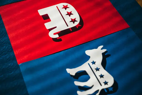 stock image Red Elephant and Blue Donkey Locked in Rivalry for U.S. Presidential Election 2024 Between Republicans and Democrats