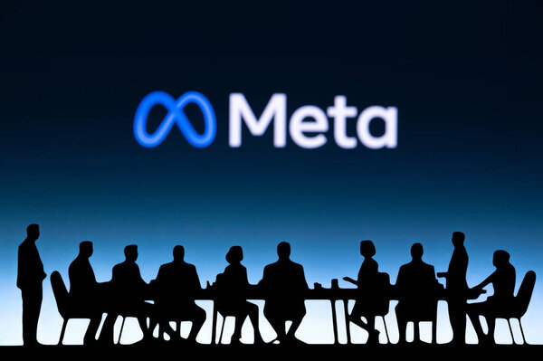 CALIFORNIA, USA, OCTOBER 10, 2024: Meta Business Strategy Session. A dynamic discussion between executives, company vision displayed on a large screen, focused on enhancing market presence.