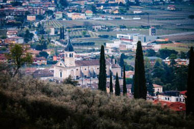 Exploring Arco. Aerial Views of a Top Tourist Destination by Lake Garda clipart