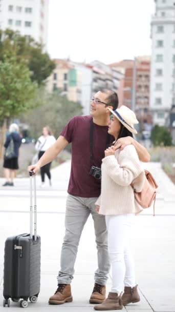 Happy Multiracial Couple Tourists Exploring City Together Pointing Sightseeing Madrid — Stock Video