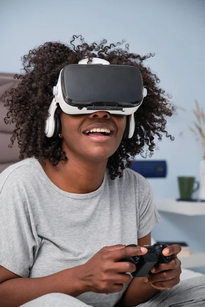 African Young Woman Enjoys Video Games Virtual Reality Her Bed — Zdjęcie stockowe