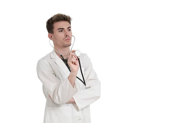 Young Caucasian Male Doctor Holding Stethoscope Isolated White Background — Zdjęcie stockowe