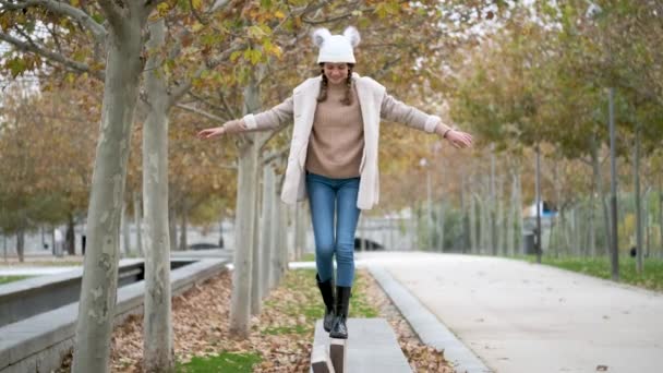Preteen Girl Two Braids Walking Balance Beam Outdoors Autumn — Vídeo de stock