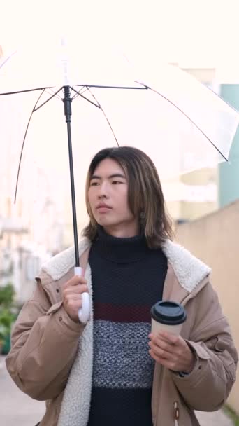 Happy Young Taiwanese Man Looking Camera Smiling Rainy Day Winter — ストック動画