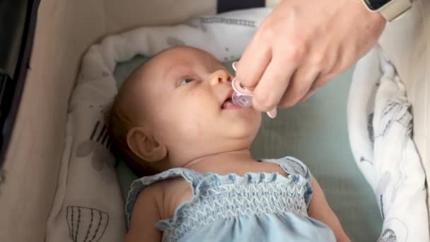 Caucasian One Month Baby Girl Trying Catch Her Pacifier Laughing — Stock Video