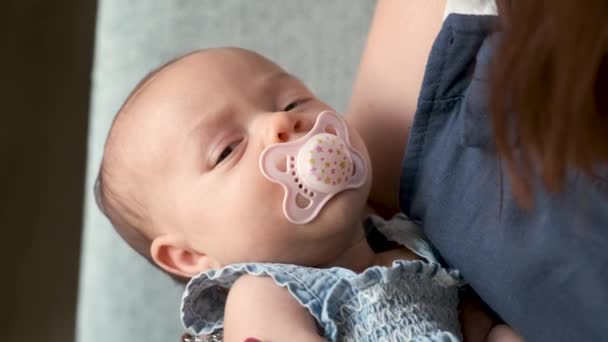 Caucasian One Month Baby Girl Pacifier Sleeping Her Mother Arms — Stock Video
