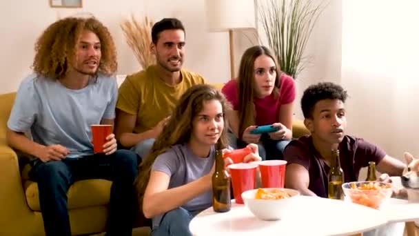 Multi Ethnic Friends Sitting Sofa Playing Video Games Shared Student — Stock Video
