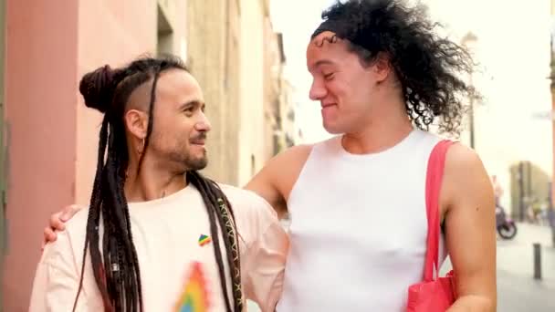 Gay Couple Talking Laughing While Walking Street Pride Parade One — стоковое видео