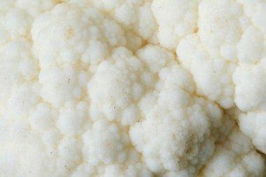 Bir karnabahar yüzeyinin makrofotoğrafçılığı ayrıntılı fraktal yapısını gözler önüne seriyor ve ilginç dokulu bir arka plan oluşturuyor.