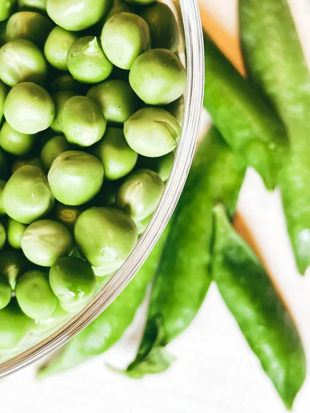 stock image Harvest organic vegetables green peas.