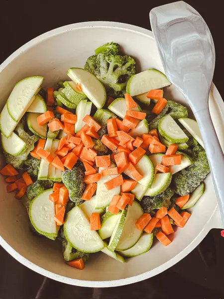 Carrot and zucchini salad in a frying pan