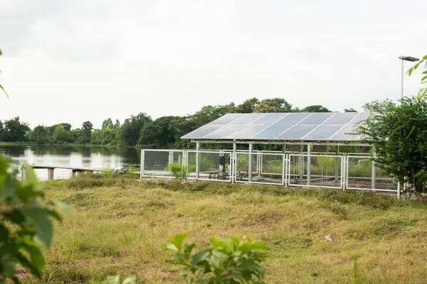 Rural agriculture solar panels with greenhouse solar power plant blue solar panel alternative electricity sources Solar farm.
