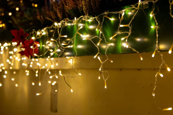 led fairy lights on a balcony at christmas in the night