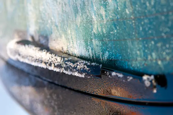 a frozen rear window wiper from a car