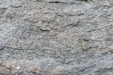 Doğal taş dokusu. İç dekorasyon ve seramik fayans yüzeyi için kullanılabilir. Eski bina duvarı arkaplanı küllerdir.