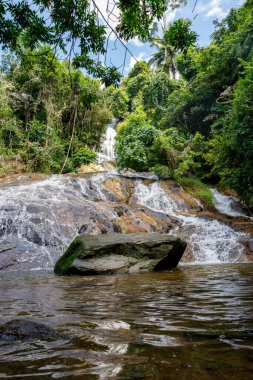 Beautiful Namuang Waterfall 2 during the rainy season in Koh Samui, Thailand clipart