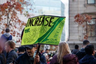 Vancouver, Canada - October 25,2019: View of sign Increase the Carbon Price as part of the Climate Strike in front of Vancouver Art Gallery clipart