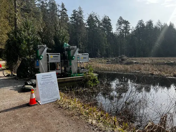 stock image Vancouver, Canada - March 17,2023: This photo, taken at Beaver Lake in Vancouver's Stanley Park, shows a sign indicating that the area is being used for filming 