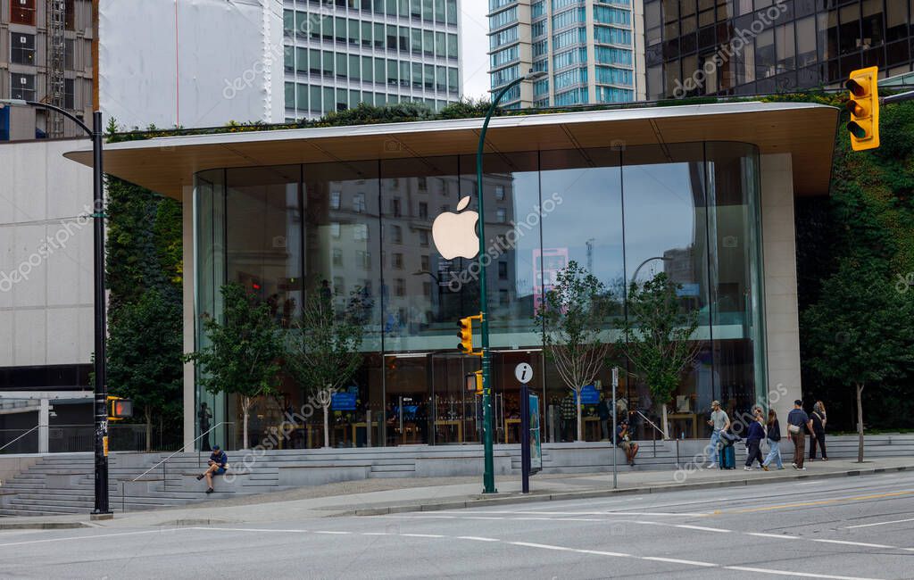 Vancouver, Canada - August 3,2025: Modern Apple Store with large glass facade and distinctive architecture in downtown Vancouver