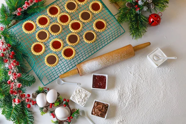 Christmas cookies with jam and hazelnut spread made with these ingredients.
