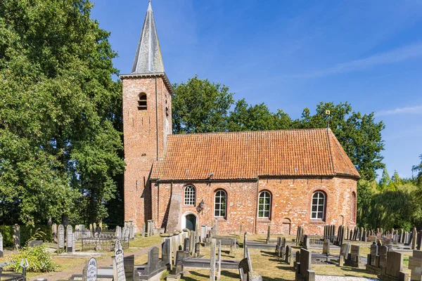 stock image Church with graveyard in Marum in municipality Westerkwartier in Groningen province the Netherlands