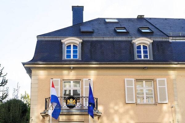 Luxembourg stadt, Luxembourg - September 30, 2022: Cityscape with embassy of the Netherlands and coat of arms with text je maintiendra in Luxembourg city in Luxembourg