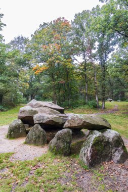 Pair of dolmen D25 in autumn setting in small village Bronneger at Hondsrug in Drenthe The Netherlands