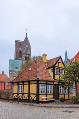Cityscape with half-timbered house and cathedral in picturesque village Ribe In Southern Jutland in Denmark. Oldest city of Scandinavia