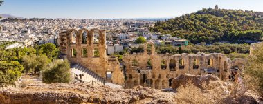 Odeon of Herodes Atticus or Herodeion Roman theatre at Acropolis site on a sunny evening in Athens in Greece
