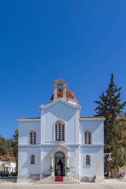 Athens, Greece - September 25, 2021: Little white church at the first cemetery of Athens were, famous Greek people are buried