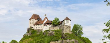 Castle of Burgdorf along the river Emme high on a hill entrance to Emmental, canton Bern in Switzerland clipart