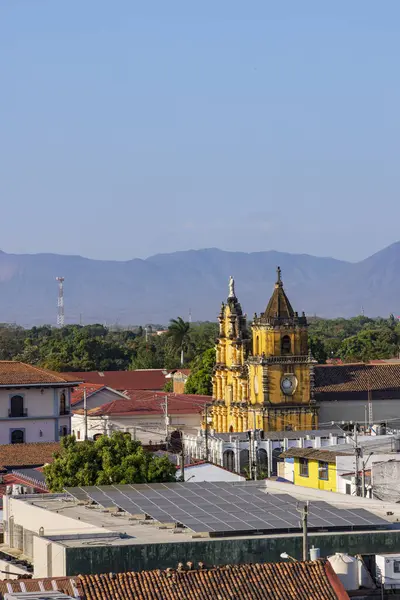 stock image Scenic view from the rooftop of the white cathedral of colonial city Leon in Nicaragua in Central America. Looking at Chuch of the Recollection.